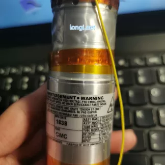 Close-up label of micro X-ray tube showing model and warning information