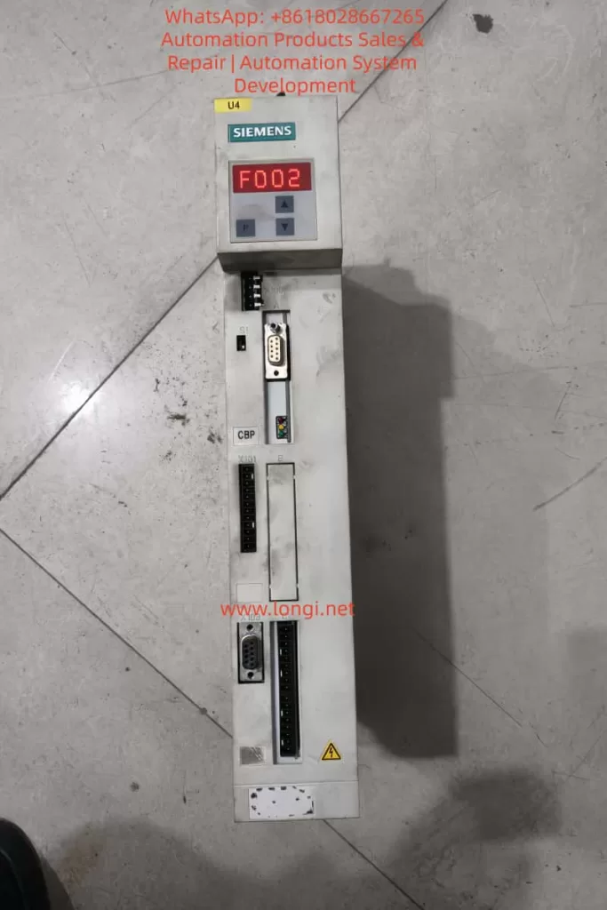 Siemens Masterdrives VC drive showing F002 precharging fault on display, DC link precharge error during startup sequence