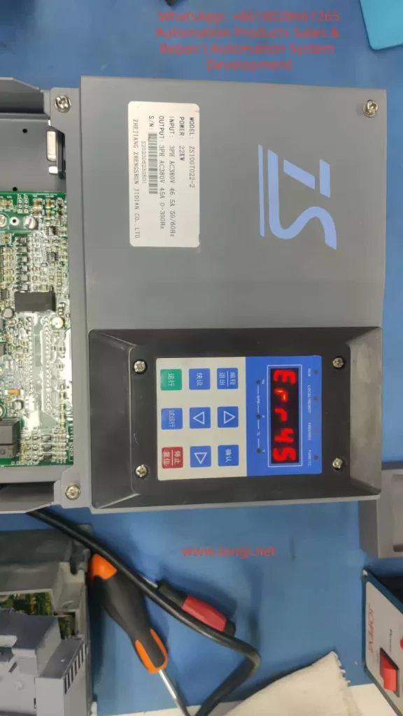 ZS100T022-2 servo drive displaying the ERR45 fault code on the screen, indicating a motor temperature overheat issue, with a close-up view of the drive and its interface