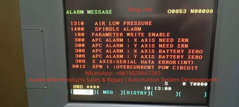 FANUC CNC controller alarm message showing spindle DC link low voltage, APC alarms, and serial communication errors