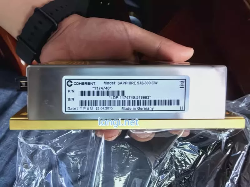 Rear view of Coherent Sapphire laser showing Part Number 1174740, Serial Number, and Made in Germany stamp