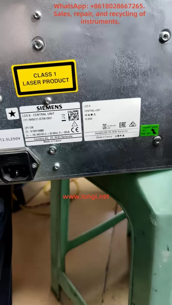 Rear label of Siemens LDS 6 central unit, model 7MB6121-0CF00-0XX1, showing Class 1 laser product warning and serial information