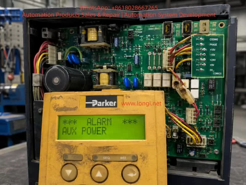 Parker 590P DC drive showing an AUX POWER alarm on the keypad with the internal power drive board exposed for troubleshooting.