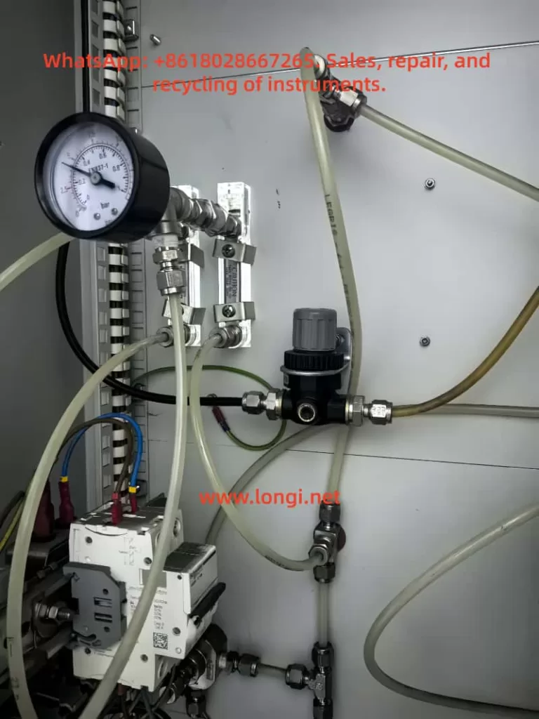 Internal gas regulation and pneumatic tubing section of an SBI gas analysis system with pressure gauge, flow controls, and sampling lines