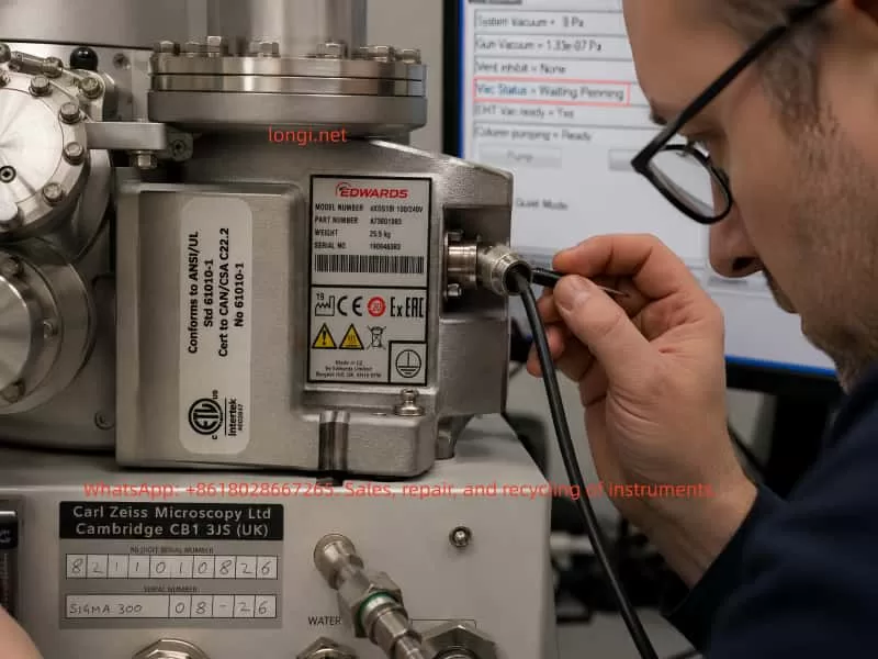 Close-up inspection of the Penning cold cathode vacuum gauge cable and connector on a ZEISS Sigma 300 SEM during “Waiting Penning” high-vacuum measurement fault diagnosis.