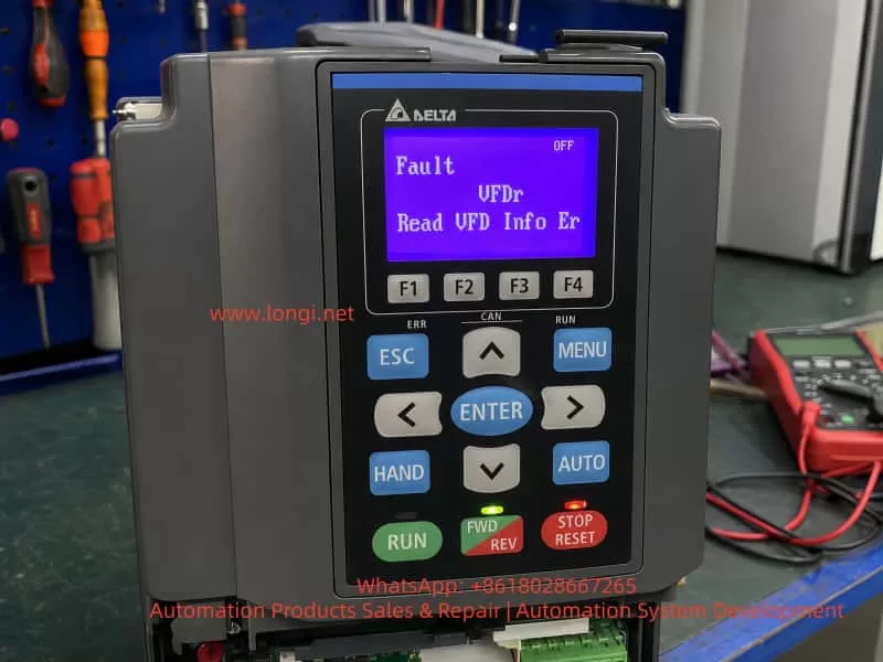 Delta C2000 series inverter showing VFDr fault and “Read VFD Info Er” message on the keypad display during workshop diagnosis.