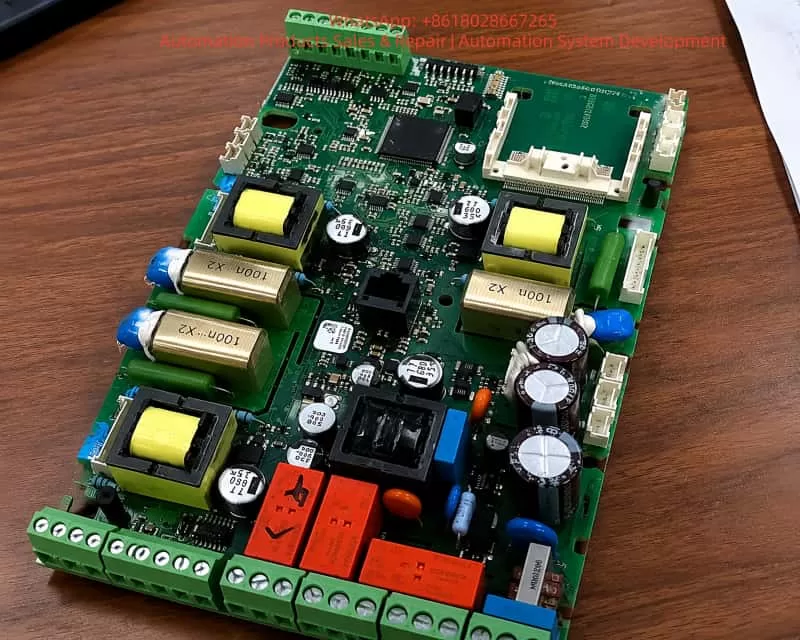 Close-up view of an ABB soft starter power supply board with switching transformers, capacitors, connectors, and electronic components for industrial motor control system repair and troubleshooting.
