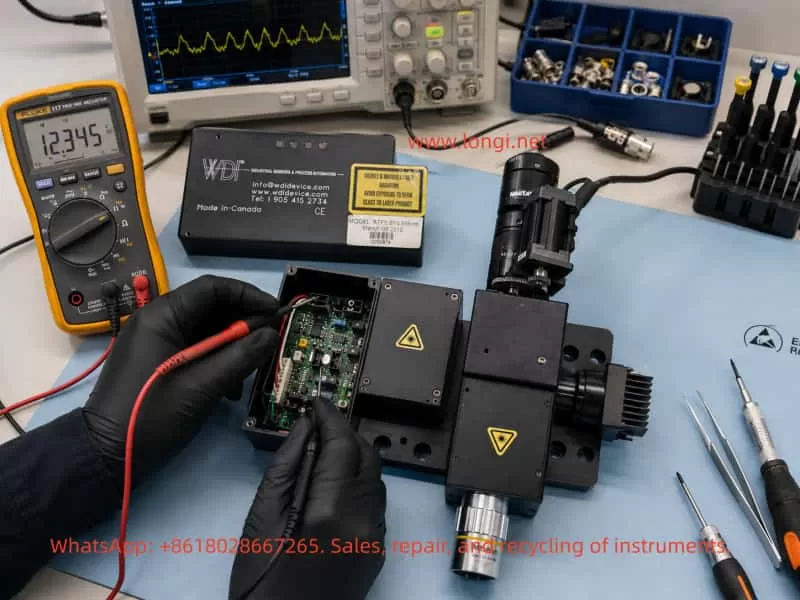 WDI ATF5 laser displacement sensor repair process with technician testing internal electronics using multimeter and oscilloscope on an industrial maintenance workbench