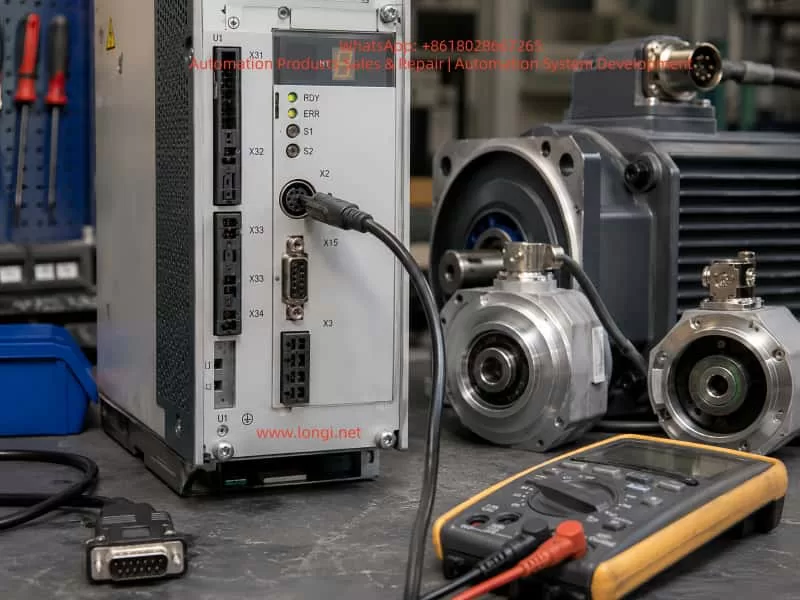 Close-up of an industrial servo drive test setup with Bosch Rexroth IndraDrive interfaces, connected encoder cables, servo motors, D-sub connector, and digital multimeter on a maintenance workbench.
